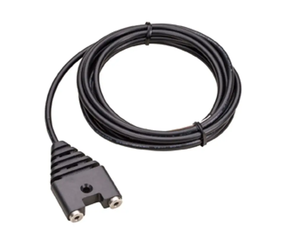Wassersensor von Grünbeck mit einem Kabel, das aufgerollt ist. Der Anschluss hat zwei Buchsen und eine gerippte Basis zum Stabilisieren.